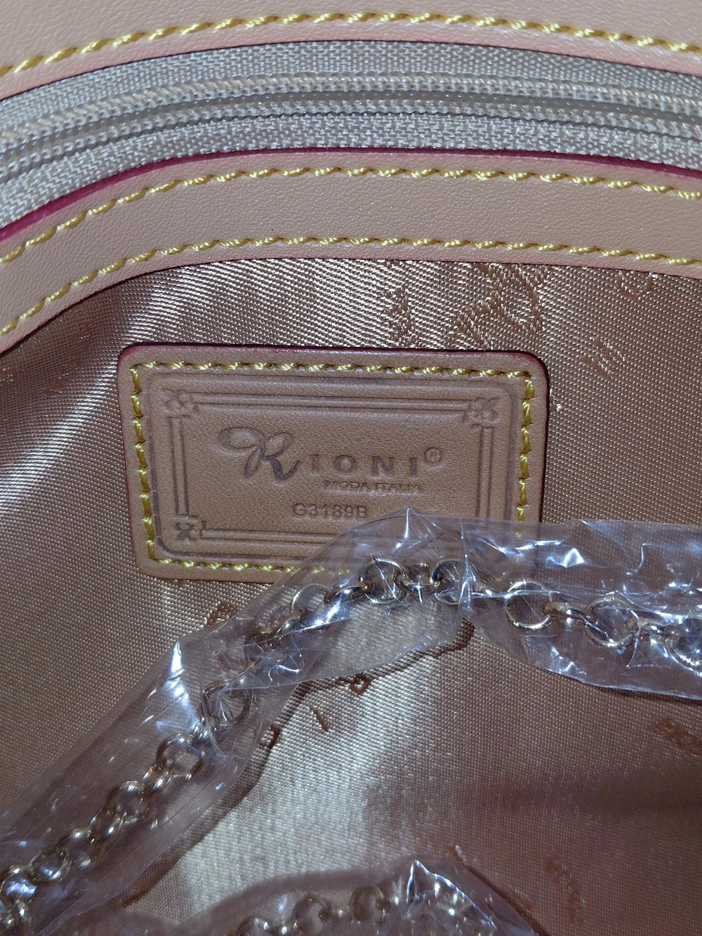 Rioni Cream Monogram Clutch with Gold Emblem